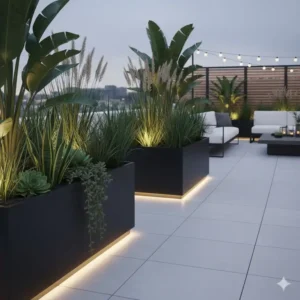 Dunkelgraue, große Pflanzgefäße als stilvolle gartendeko terrasse modern, perfekt für Ziergräser und Akzentpflanzen.